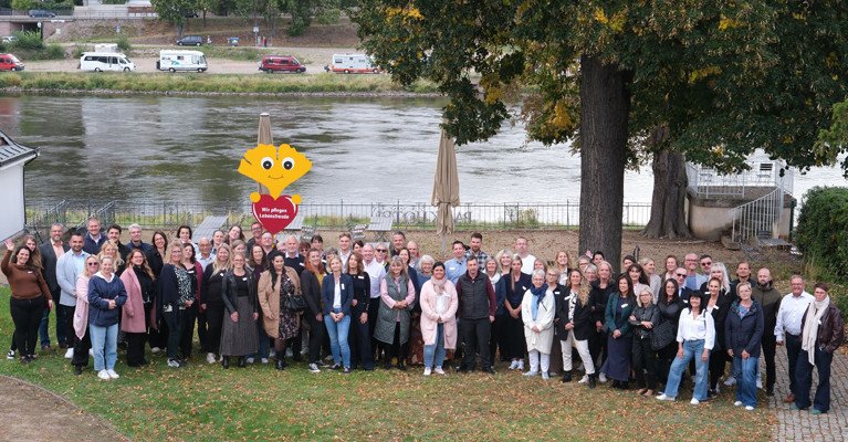 Mitarbeiter*innen der ProCurand bei einer Veranstaltung der ProCurand Campus gGmbH